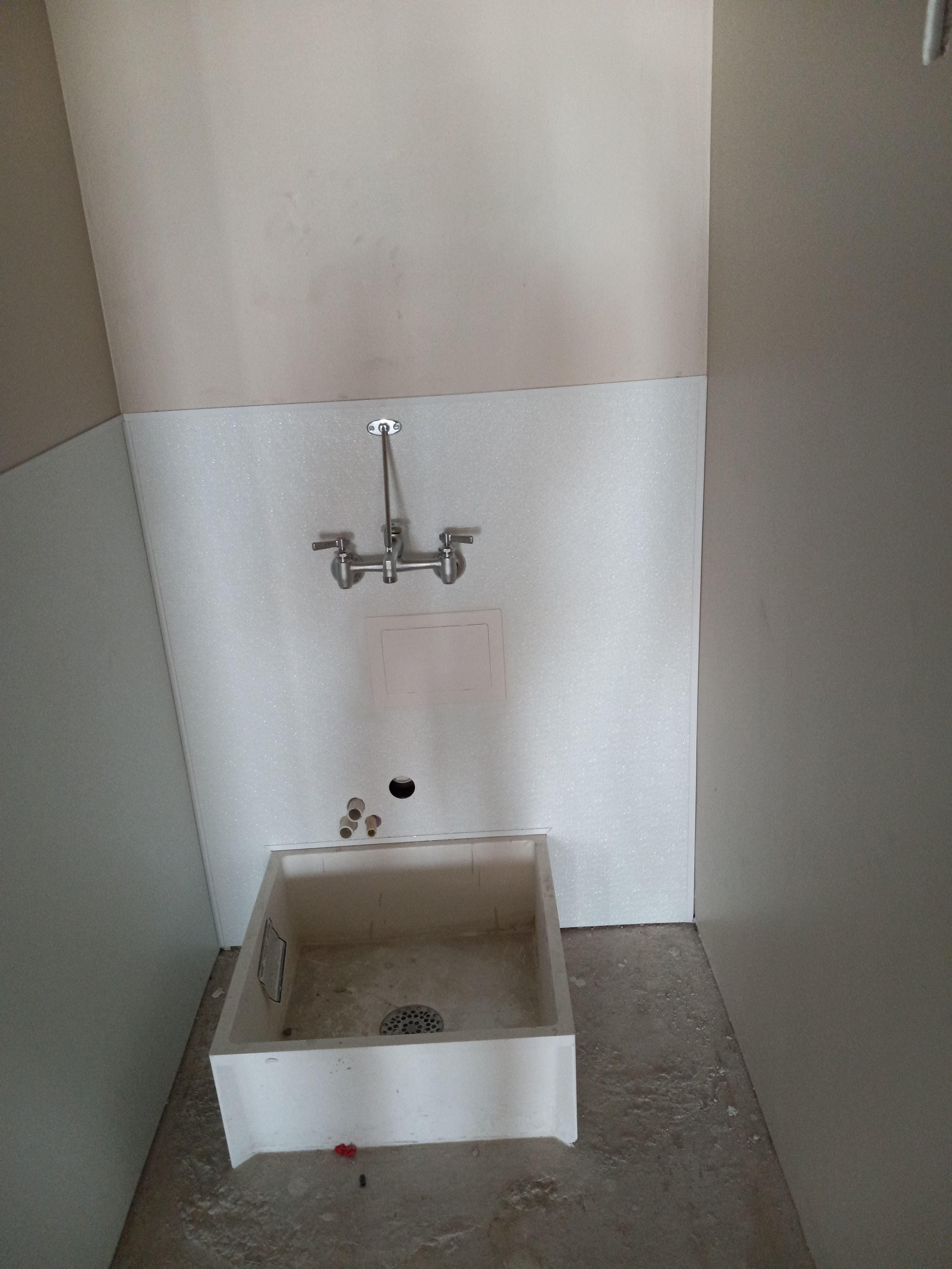 A bathroom with a sink and a toilet in it